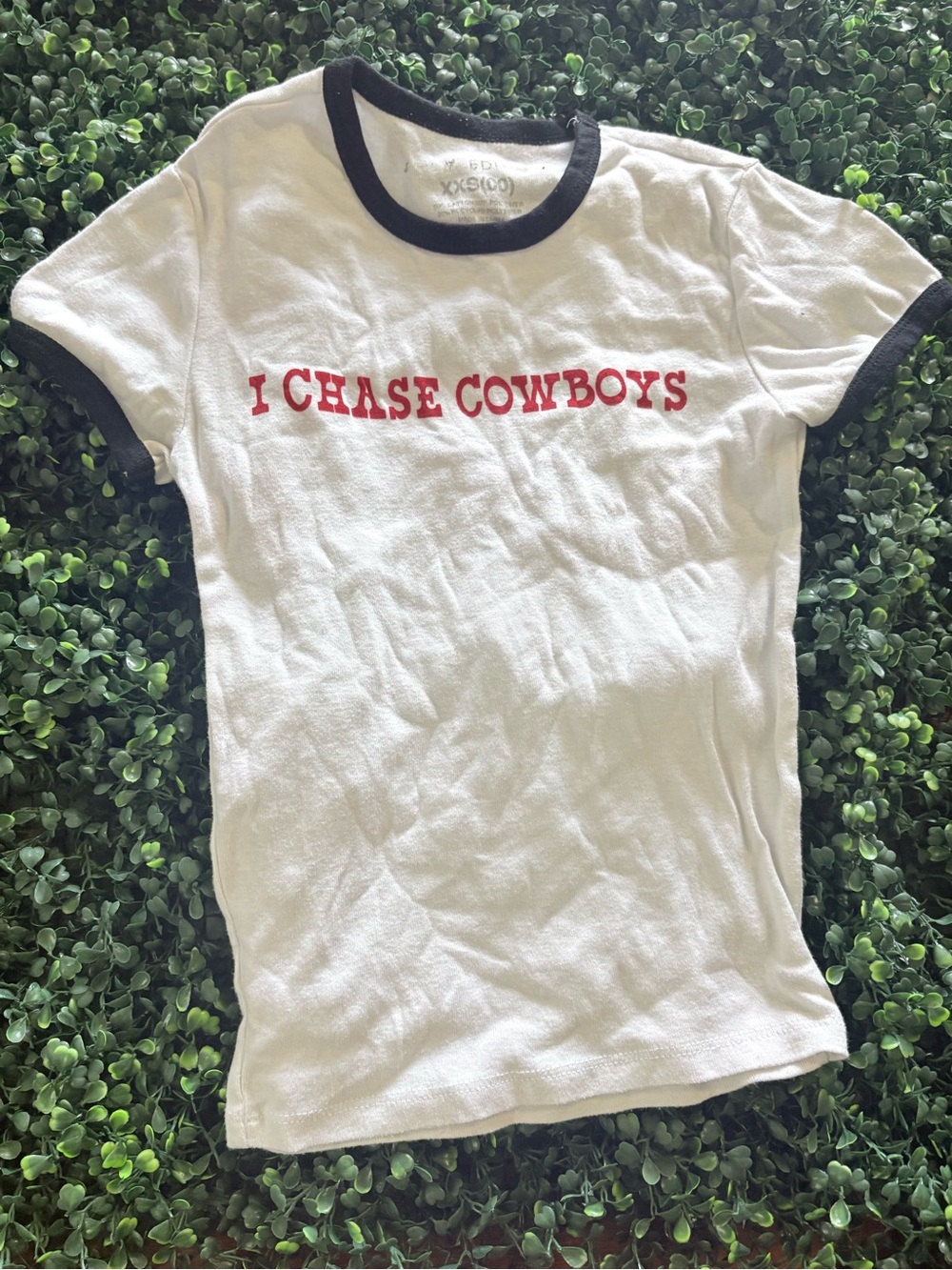 White Ringer Tee with Black Trim and Red 'I CHASE COWBOYS' Graphic